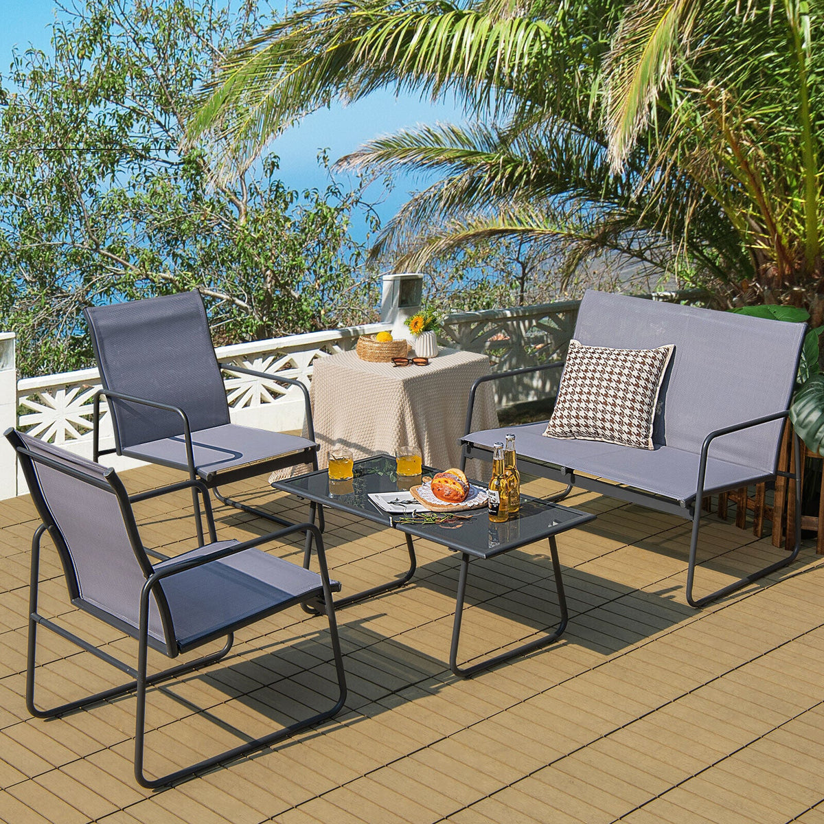 4 Pieces of Metal Patio Set with Tempered Glass Coffee Table