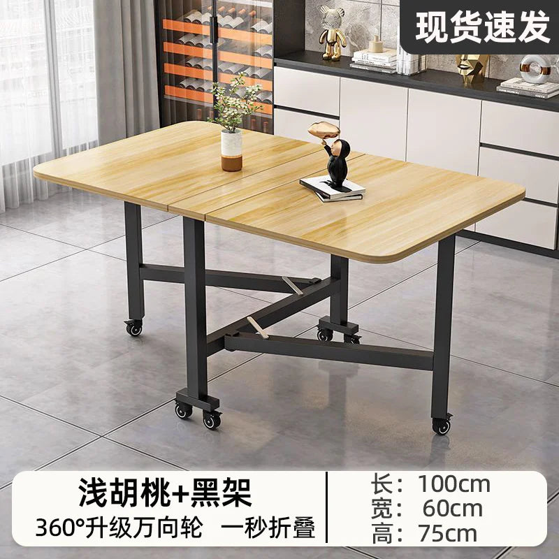 Folding dining table for small household
